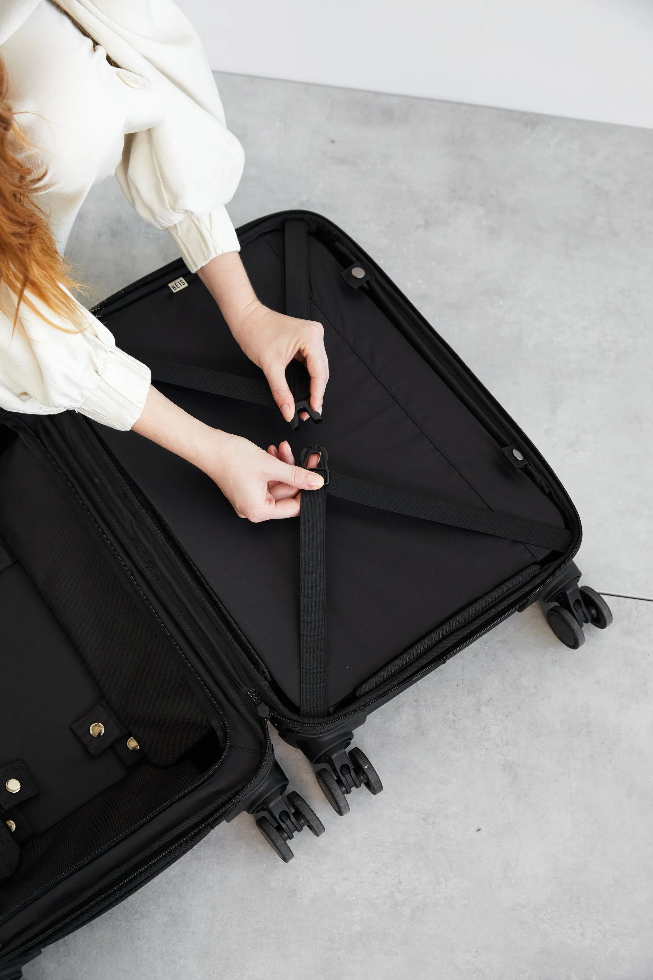 Soft-Sided Collapsible Carry-On Roller in Black